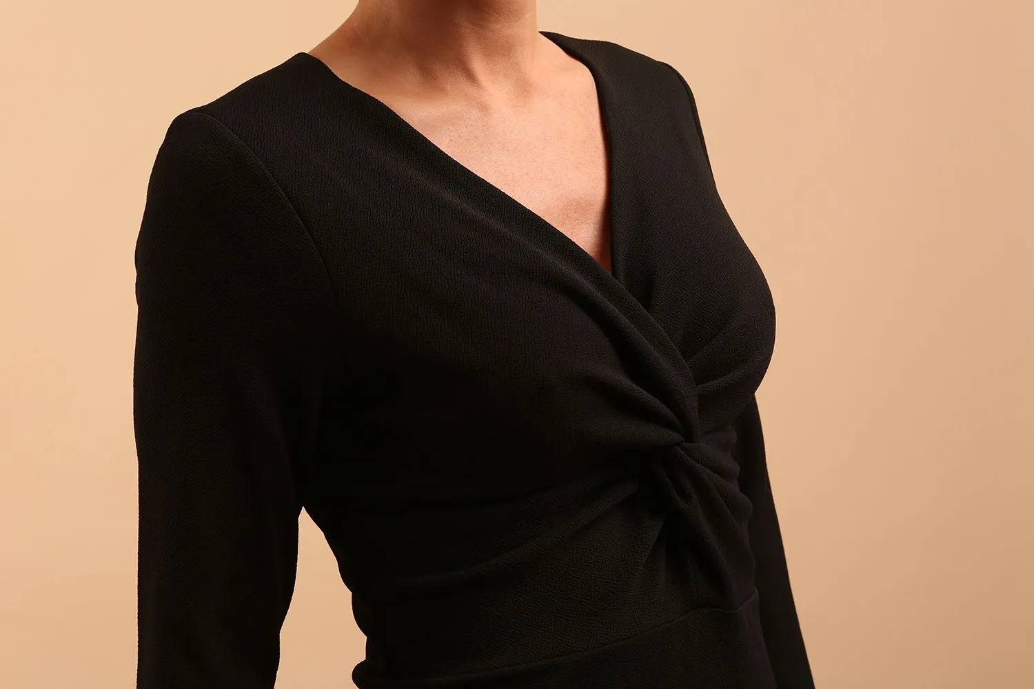 Gately Long Sleeve Twisted Low V-Neck Pencil Dress
