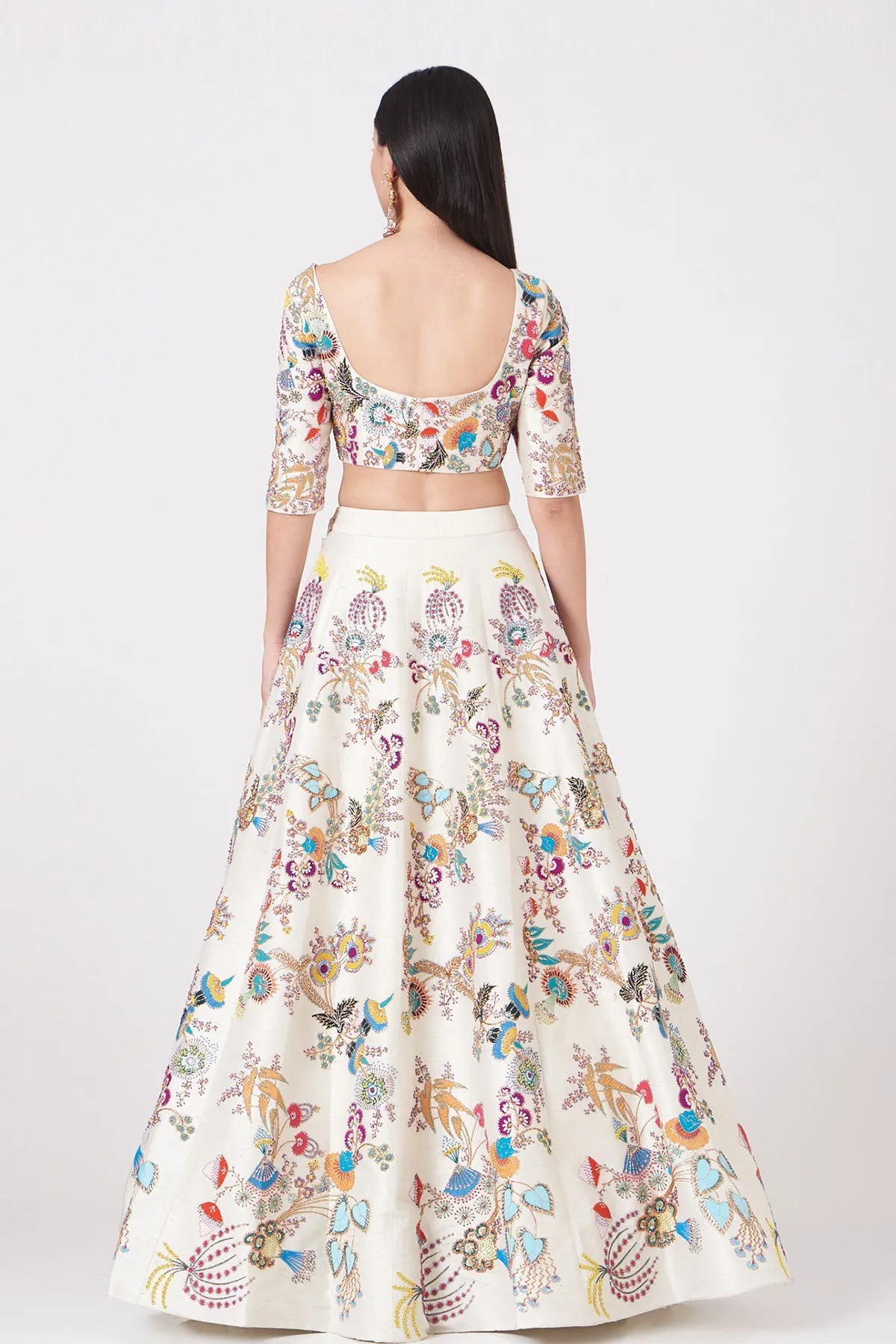 Ivory Paper Dolls Raw Silk Appliquéd And Embellished Lehenga With Blouse And Cutwork Tulle Dupatta