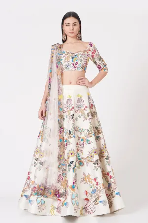 Ivory Paper Dolls Raw Silk Appliquéd And Embellished Lehenga With Blouse And Cutwork Tulle Dupatta