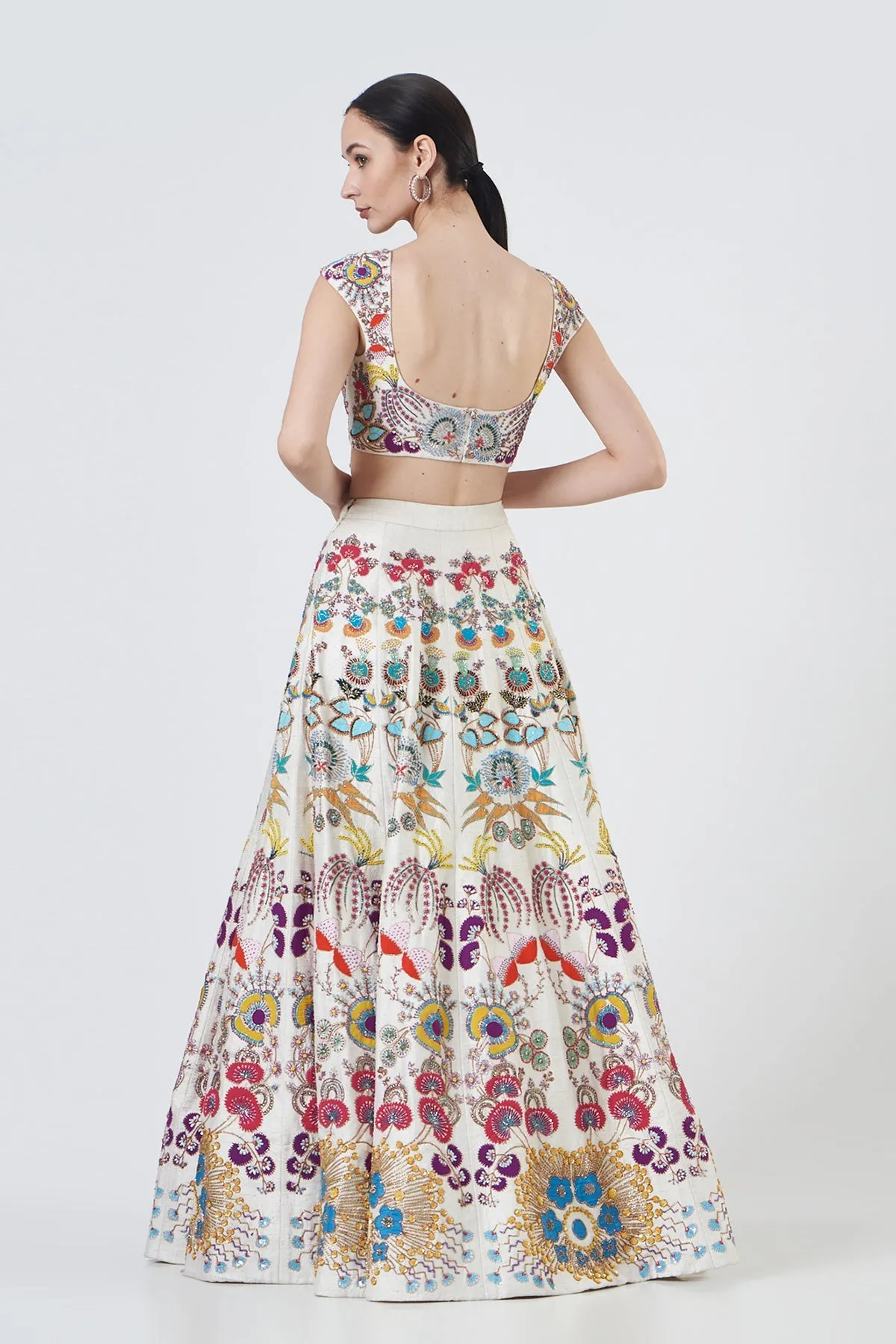 Ivory Paper Dolls Raw Silk Appliquéd And Embellished Lehenga With Blouse And Cutwork Tulle Dupatta
