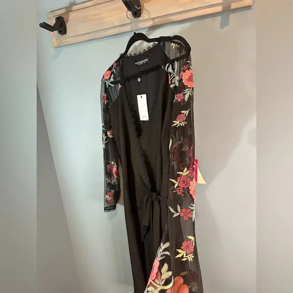 Little Mistress Plus Wrapover Black Pencil Dress With Embroidered Sleeve Detail
