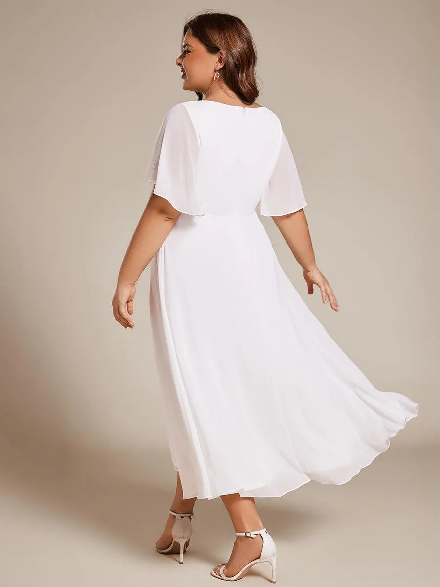 Robe d'invité de mariage mi-longue en mousseline de soie à col en V de grande taille avec applique à la taille